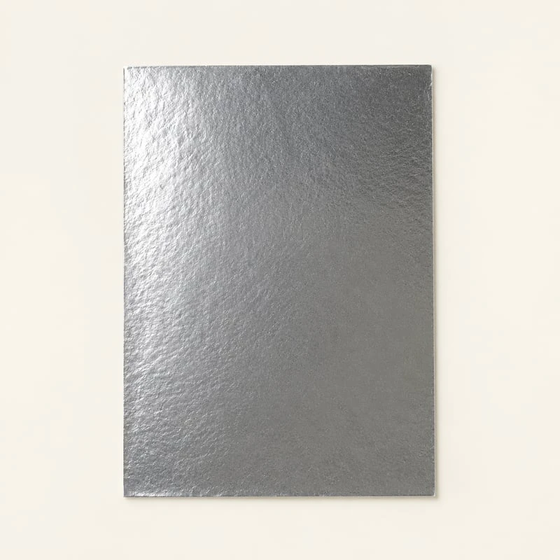 Muster aus reflektierendem Silberfolienpapier